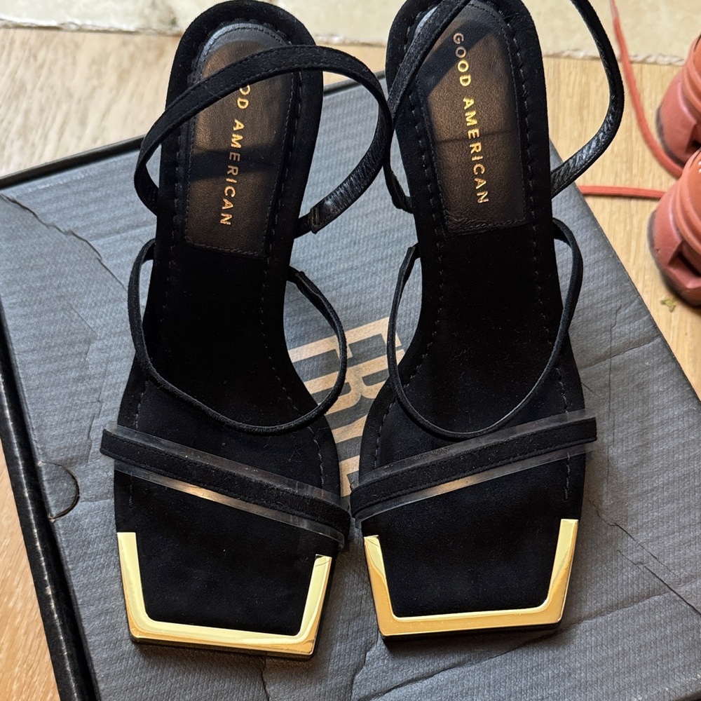 Good American Black Heels with Gold Accents